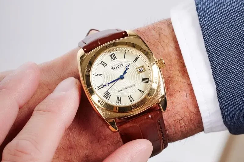 Timemaster Piezo Watch with gold-finished alloy case and genuine brown leather strap